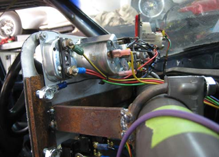 Illustration for article titled Welcome To Low-Budget Race Car Wiring Hell!